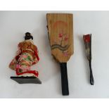 Three Japanese items - a Hagoita New Year paddle 49cm long, China headed doll 28 high and a fan 28.