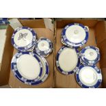 A collection of blue and gilt ironstone Coronation ware to include serving platters, tureens,