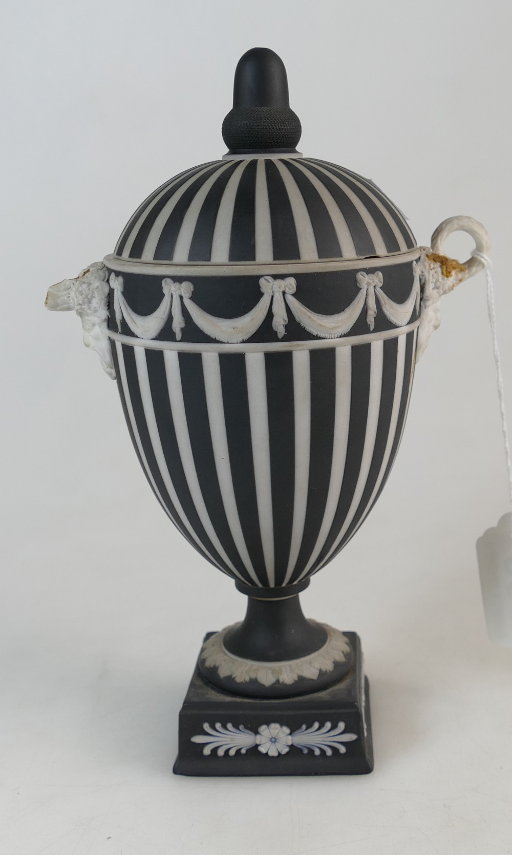 Wedgwood black & white dip jasper ware two handled urn & cover, height 22.