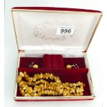 A vintage Amber Baltic Butterscotch Honey Amber necklace with pair amber earrings with silver