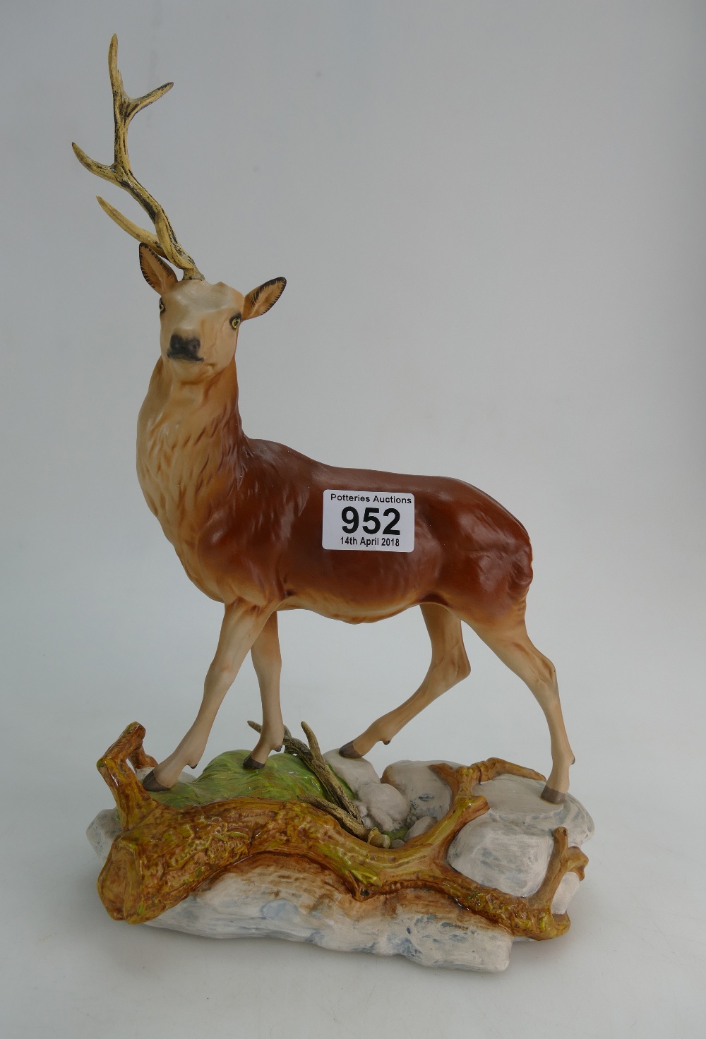 Beswick stag on rock 2629 (horn detached) marked Royal Doulton seconds