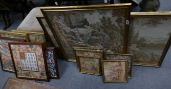 A large selection of framed embroideries including period scenes and a similar sampler type item.
