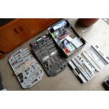 A mixed collection of tool and drill bits to include - several boxes of screws, measuring tapes,