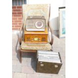 Reproduction armchair, Itek branded record player,