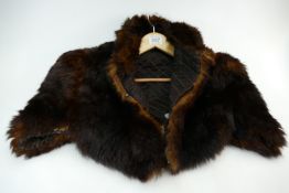 A Mink Stole, lining has become detached in places.