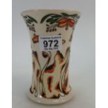 A Moorcroft vase in the Cats & Butterfli