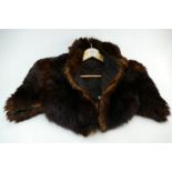 A Mink Stole, lining has become detached