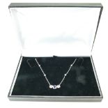 18ct white gold pendant and necklace set with precious stones surrounded by diamonds, 5.