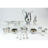 A collection of silver items including cruets and ornate tray,