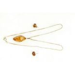 9ct Gold pendant set with oval Amber, pair matching earrings and 9ct gold necklace, total weight 7.