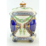 Victorian Wedgwood Majolica large lidded jar on ball feet ornamented with strap work panels and