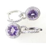 18ct White gold pair earrings, each set with an 8mm Amethyst stone surrounded by 44 diamonds, 6.