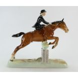 Beswick model of a lady riding side saddle jumping a fence 982