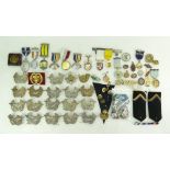 Large quantity military cap and other badges, medals, military buttons etc.