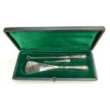 Cased silver handled Shoe Horn and two sizes of button hooks.