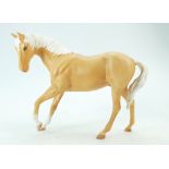 Beswick palomino matte Horse Spirit of Youth 2703 and a similar brown gloss example (2)