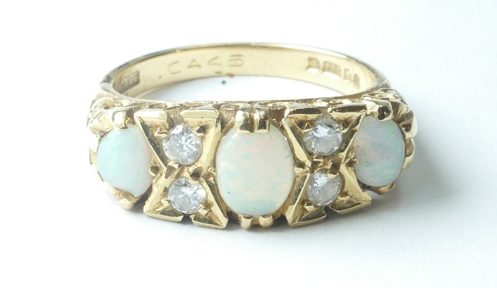 18ct gold Opal & Diamond set Victorian style ring, chip to one opal size N. 6.2g.