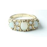 18ct gold Opal & Diamond set Victorian style ring, chip to one opal size N. 6.2g.