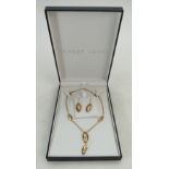 9ct Gold ornate necklace with pair of matching earrings,10.