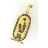 Egyptian yellow metal pendant, 5.