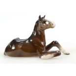 Beswick seated brown foal 2460