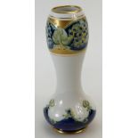 William Moorcroft Macintyre vase decorated with panels of Lilac on white and gold ground,