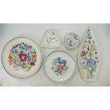 A collection of floral decorated Poole Pottery items to include spear platter, serving platter,