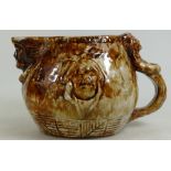 Royal Doulton Lambeth stoneware American Indian Pitcher jug decorated in a two tone brown glaze,
