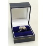 18ct White gold ladies diamond Crossover ring, each round set containing 7 diamonds, size K,