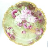 Limoges hand decorated large floral wall plaque 40cm wide, signed M Ciline.