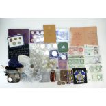 A good collection of coins including silver coins, proof coin sets, banknotes, commemorative coins,