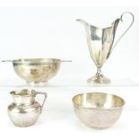 Four pieces of silver - jug, quaich (with dedication), cream jug (with dent) and bowl. 348.