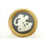Wedgwood gilt framed 19th Century circular plaque, high relief with cupid sharpening his arrows,