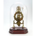 A good quality reproduction brass skeleton clock in glass dome and wood plinth,