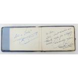 A small leather Autograph album containing various signatures including Stan Laurel & Oliver Hardy,