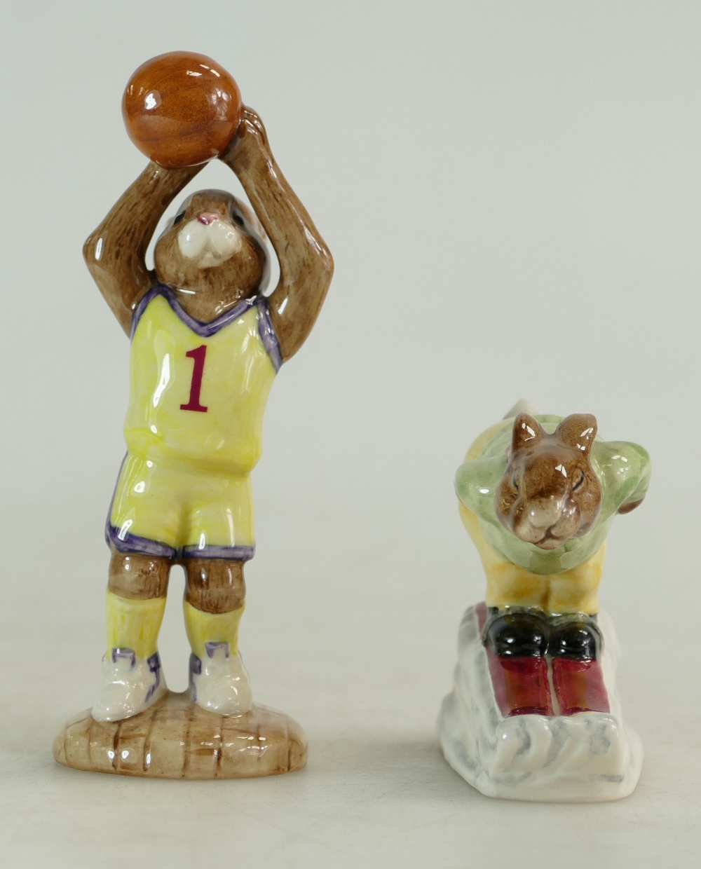 A Royal Doulton Bunnykin figure Basketball DB262 (with cert) and Downhill DB31 (2)