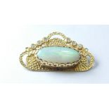 An impressive Opal & Diamond set Victorian style brooch, 11.6g.