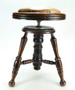 Chad Parker Co piano stool with oak turned legs, height adjustable and detachable leather cushion.