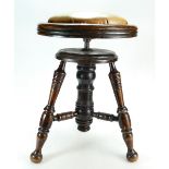 Chad Parker Co piano stool with oak turned legs, height adjustable and detachable leather cushion.