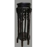 19th / 20th Century carved vase stand with marble inset, Dragon decoration to uprights,