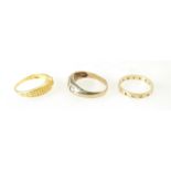 Three gold rings - 22ct gold dress ring stamped .