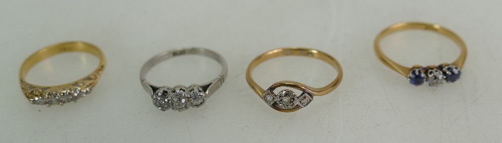 Four diamond rings - platinum and three diamond ring, 9ct and platinum three stone ring,