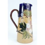 A Doulton & Slaters Lambeth stoneware floral jug with metal cover and a Royal Doulton stoneware