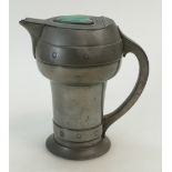 Art Nouveau pewter water jug decorated with inset Ruskin heart shaped plaque, height 16.