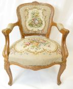 Louis XV style carved oak and needlepoint armchair
