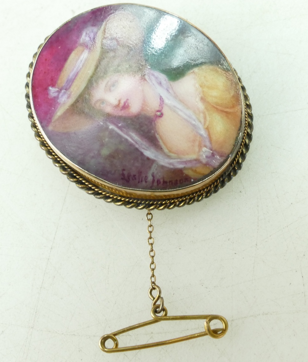 9ct Rose Gold oval brooch mounted with pottery portrait of a lady in bonnet signed by Leslie