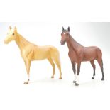 Beswick Palomino matte Bois Roussel horse 701 and a similar brown matte example (2)
