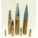 Collection of brass artillery shells, (7) tallest 68cm.
