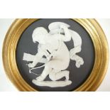 Wedgwood gilt framed 19th Century circular plaque, high relief with cupid stringing his bow,