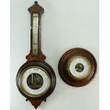 An antique walnut Barometer and Thermometer 50cm, together with a circular oak barometer 19cm (2).